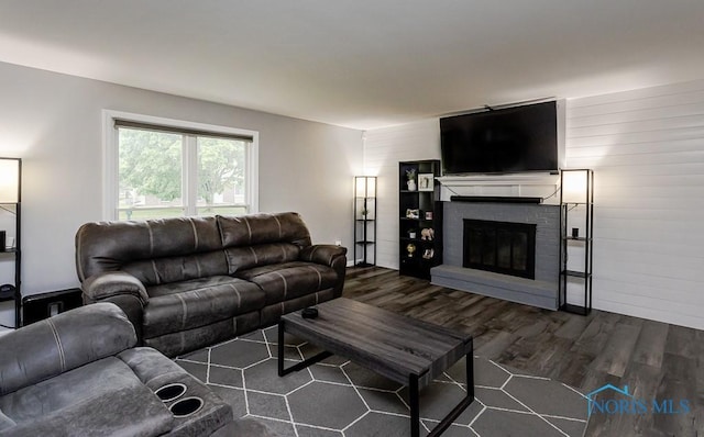 510 N Wintergarden Rd, Bowling Green, OH 43402 - living room with dark wood-style flooring and a brick fireplace