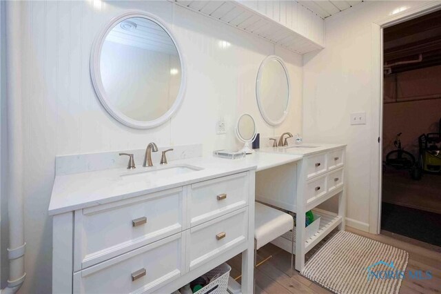 501 Flintlock Ct, Findlay, OH 45840 - full bathroom featuring vanity and wood finished floors