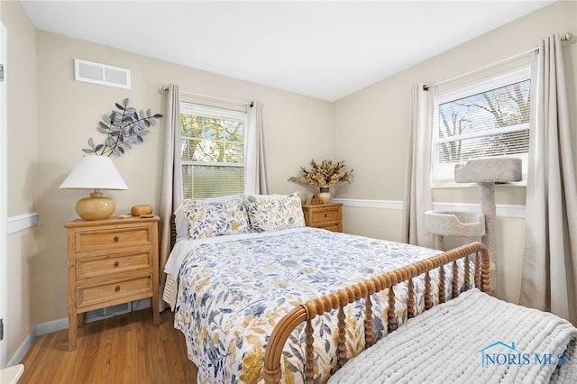 2324 Secor Rd, Toledo, OH 43606 - bedroom with wood finished floors and baseboards