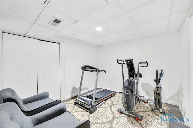 2324 Secor Rd, Toledo, OH 43606 - exercise room featuring baseboards and a drop ceiling