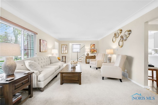 2324 Secor Rd, Toledo, OH 43606 - living room with stairway, carpet flooring, and baseboards
