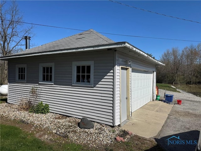 5412 Evansport Rd, Defiance, OH 43512 - view of side of property with an outdoor structure and a detached garage