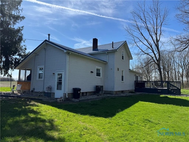 5412 Evansport Rd, Defiance, OH 43512 - back of house featuring a chimney, a yard, and a deck