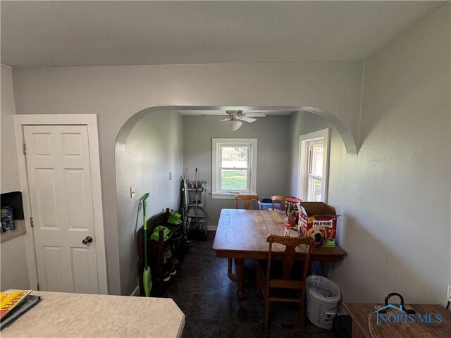 5412 Evansport Rd, Defiance, OH 43512 - dining room featuring arched walkways and ceiling fan