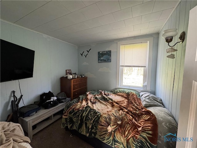 5412 Evansport Rd, Defiance, OH 43512 - bedroom featuring ornamental molding and wooden walls