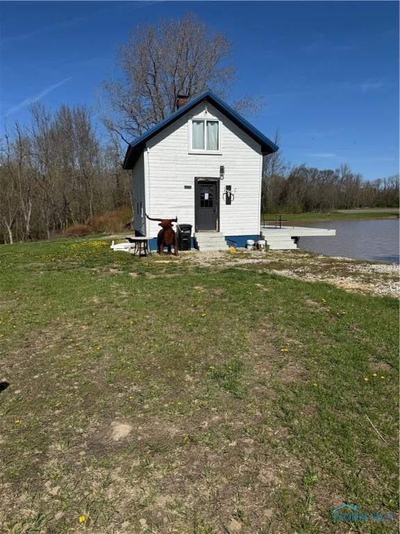 5412 Evansport Rd, Defiance, OH 43512 - view of outbuilding with a water view and entry steps