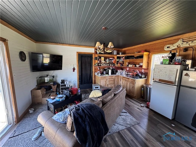 5412 Evansport Rd, Defiance, OH 43512 - living room with wooden walls, a chandelier, dark wood-type flooring, and wooden ceiling