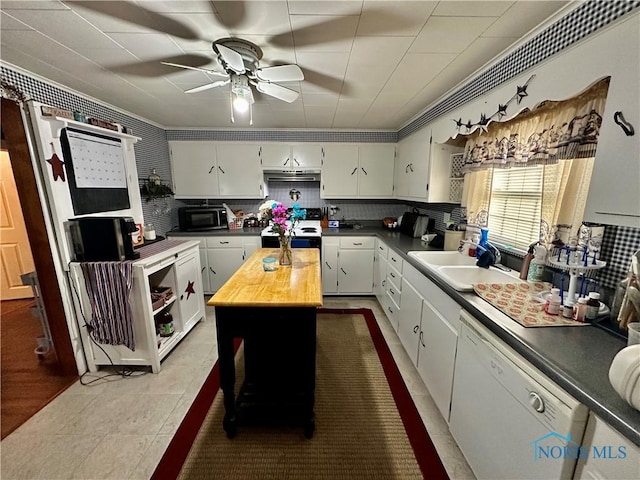 203 Washington St, Bettsville, OH 44815 - kitchen featuring dishwasher, electric range, ceiling fan, a sink, and white cabinets