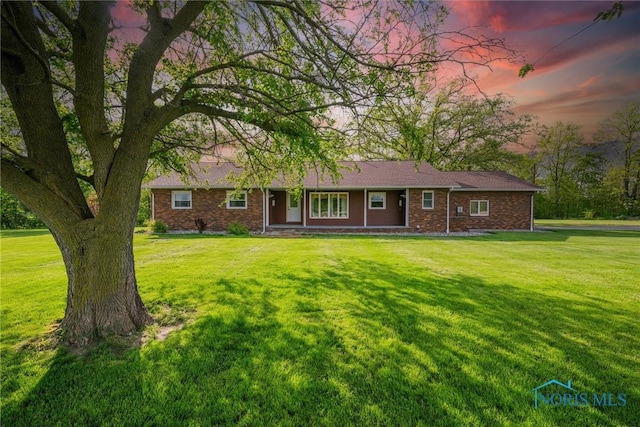 1473 State Route 66, Stryker, OH 43557 - single story home with a yard and brick siding
