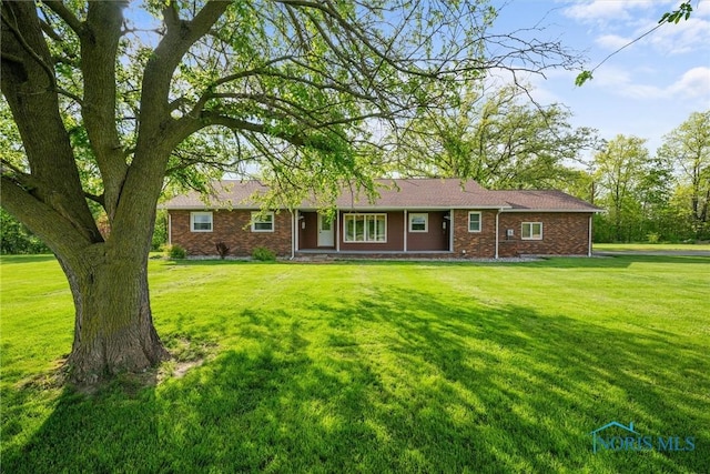 1473 State Route 66, Stryker, OH 43557 - ranch-style house featuring a front yard and brick siding