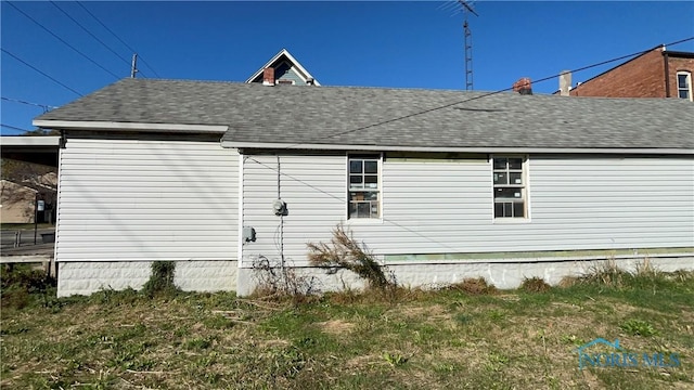 626 Walnut St, Toledo, OH 43604 - view of side of home featuring a shingled roof