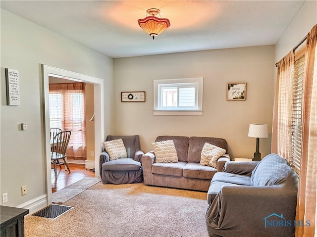 348 S 8th St, Upper Sandusky, OH 43351 - carpeted living room featuring baseboards