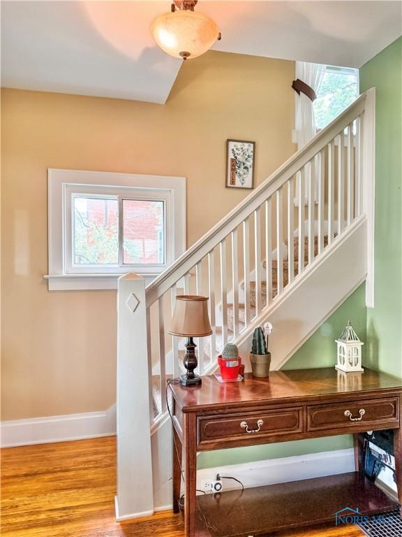 348 S 8th St, Upper Sandusky, OH 43351 - stairs with wood finished floors and baseboards