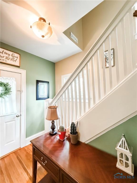 348 S 8th St, Upper Sandusky, OH 43351 - foyer featuring wood finished floors and stairs