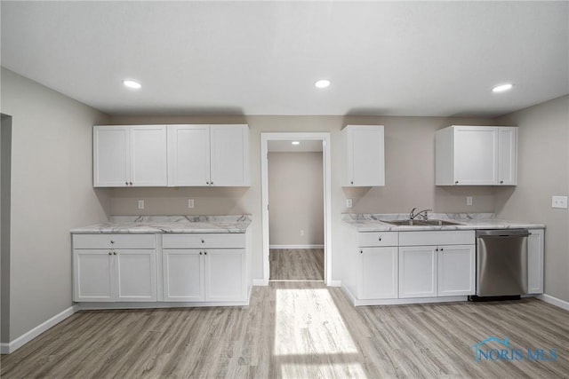145 E Crocker St, Fostoria, OH 44830 - kitchen featuring dishwasher, a sink, baseboards, light wood finished floors, and recessed lighting
