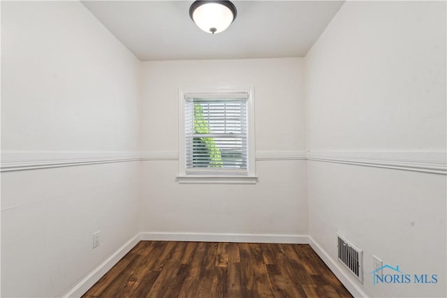 2904 Goddard Rd, Toledo, OH 43606 - empty room with wood finished floors and baseboards