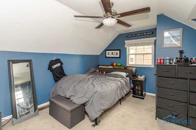 2838 Secor Rd, Toledo, OH 43606 - carpeted bedroom featuring lofted ceiling, baseboards, and a ceiling fan