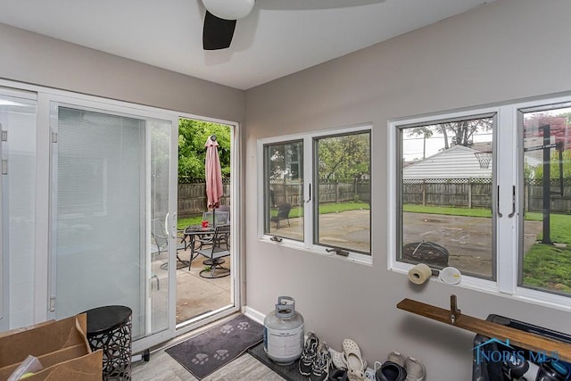 2838 Secor Rd, Toledo, OH 43606 - sunroom with healthy amount of natural light, ceiling fan, and wood finished floors