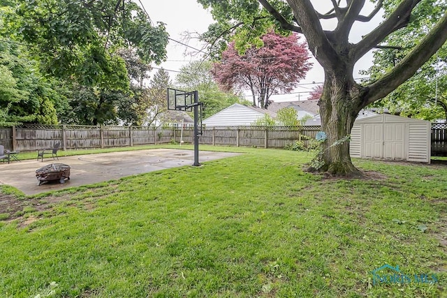 2838 Secor Rd, Toledo, OH 43606 - view of yard featuring a fire pit and a patio area