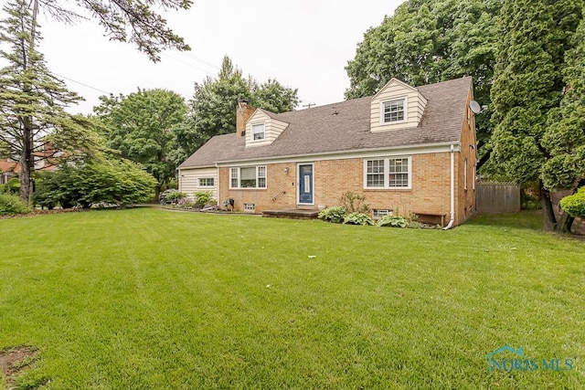 2838 Secor Rd, Toledo, OH 43606 - cape cod-style house with brick siding, a chimney, and a shingled roof