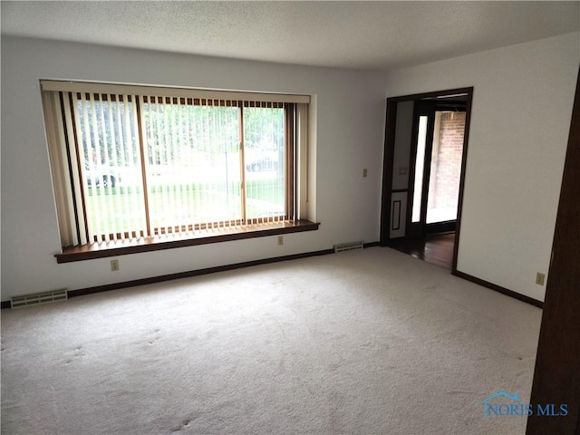725 Ashbury Dr, Perrysburg, OH 43551 - carpeted empty room with baseboards