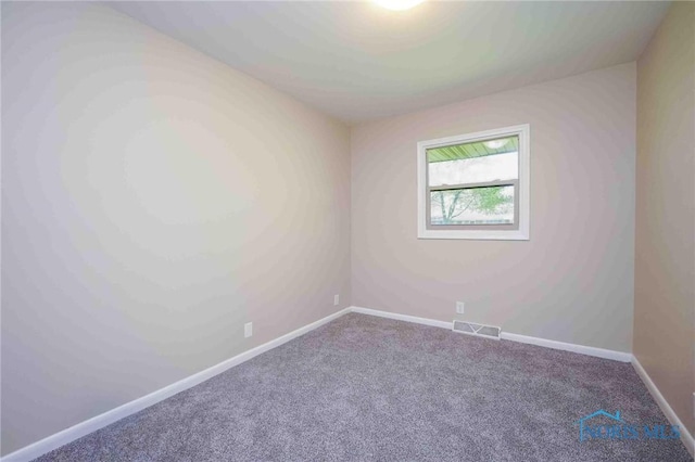 1816 Cherry Ln, Findlay, OH 45840 - carpeted spare room featuring baseboards
