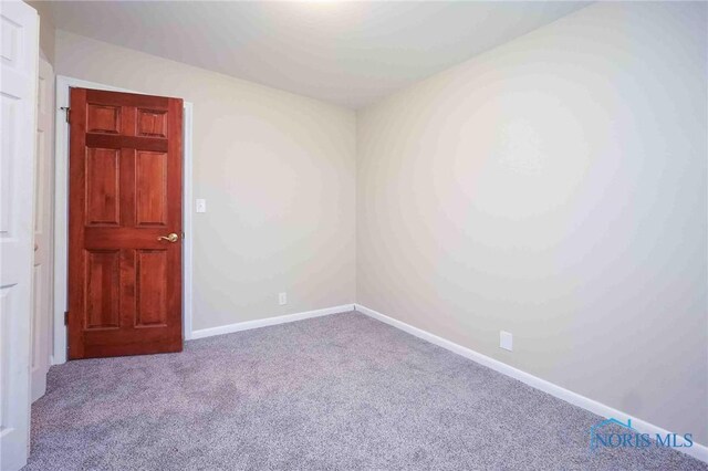 1816 Cherry Ln, Findlay, OH 45840 - empty room with carpet flooring and baseboards