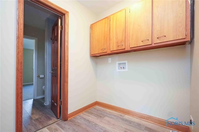 1816 Cherry Ln, Findlay, OH 45840 - laundry area with cabinet space, light wood-type flooring, hookup for a washing machine, and baseboards