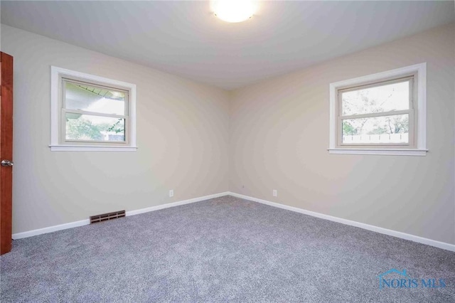 1816 Cherry Ln, Findlay, OH 45840 - empty room with carpet flooring and baseboards