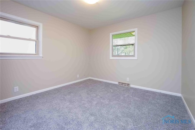 1816 Cherry Ln, Findlay, OH 45840 - carpeted spare room featuring baseboards