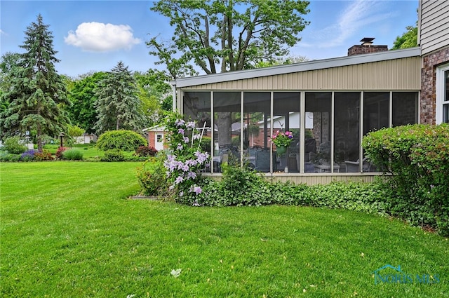 2009 Saratoga Dr, Findlay, OH 45840 - view of green lawn featuring a sunroom