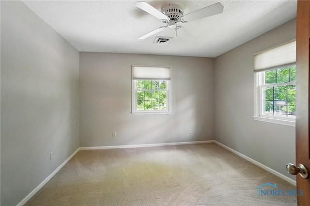 1301 Forest Park, Findlay, OH 45840 - carpeted spare room with baseboards and ceiling fan