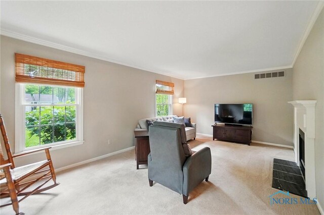 1301 Forest Park, Findlay, OH 45840 - living room featuring crown molding, light carpet, baseboards, and a fireplace with flush hearth