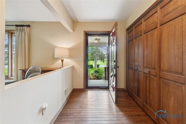 2142 Tracy Rd, Northwood, OH 43619 - foyer entrance featuring hardwood / wood-style floors and baseboards