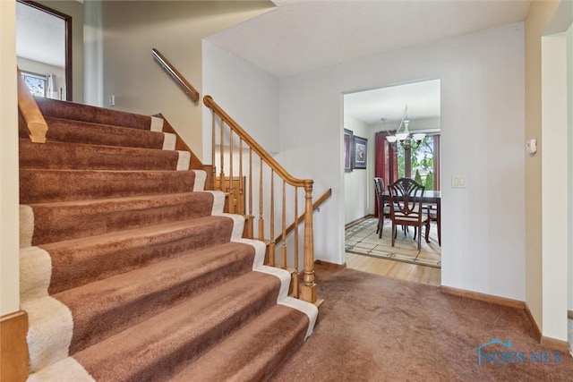 2142 Tracy Rd, Northwood, OH 43619 - stairway with carpet and baseboards