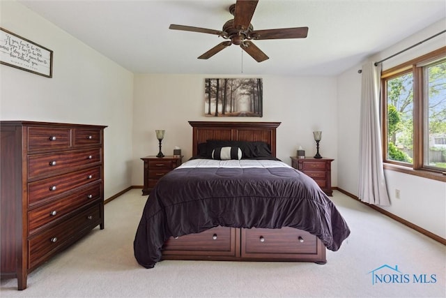 2142 Tracy Rd, Northwood, OH 43619 - bedroom with light carpet, baseboards, and ceiling fan