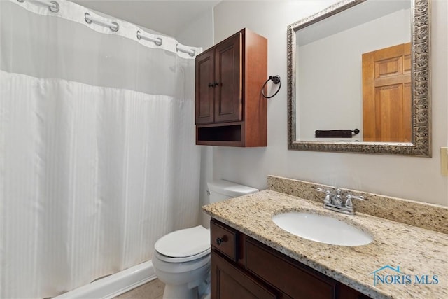 2142 Tracy Rd, Northwood, OH 43619 - bathroom with toilet, vanity, and curtained shower