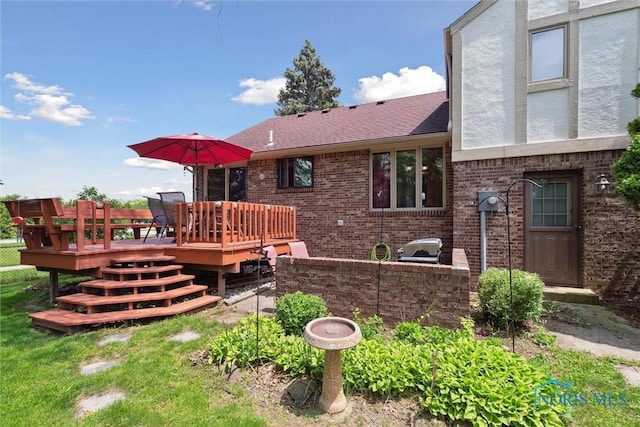 2142 Tracy Rd, Northwood, OH 43619 - back of property featuring a deck and brick siding