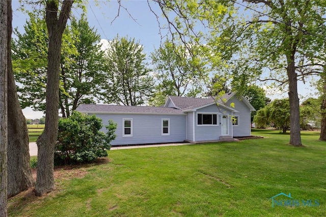 10540 Veler Rd, Curtice, OH 43412 - rear view of house with a yard and entry steps