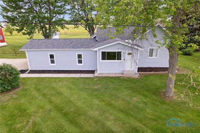 10540 Veler Rd, Curtice, OH 43412 - view of front of house with entry steps and a front yard