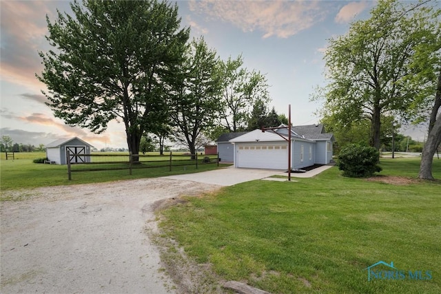 10540 Veler Rd, Curtice, OH 43412 - view of front of home featuring driveway and a garage