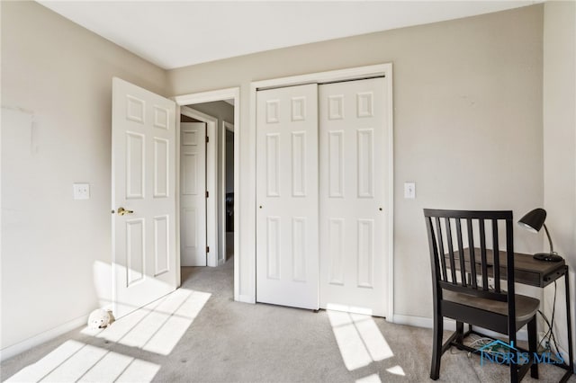 209 E Sawmill Rd, Findlay, OH 45840 - bedroom featuring carpet floors, a closet, and baseboards