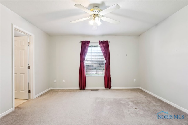 209 E Sawmill Rd, Findlay, OH 45840 - empty room with carpet flooring, baseboards, and ceiling fan