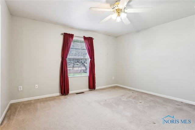 209 E Sawmill Rd, Findlay, OH 45840 - carpeted spare room featuring baseboards and ceiling fan
