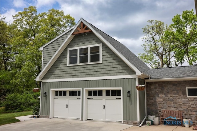 5243 Flanders Rd, Toledo, OH 43623 - garage featuring concrete driveway