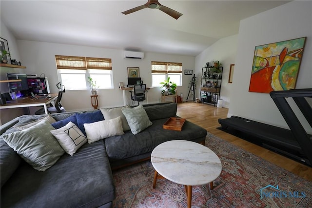 5243 Flanders Rd, Toledo, OH 43623 - living room featuring wood finished floors, a wall mounted AC, an office area, a ceiling fan, and lofted ceiling