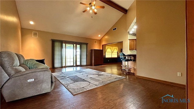 12327 Buckeye Dr, Paulding, OH 45879 - living room with high vaulted ceiling, ceiling fan, beamed ceiling, and wood finished floors