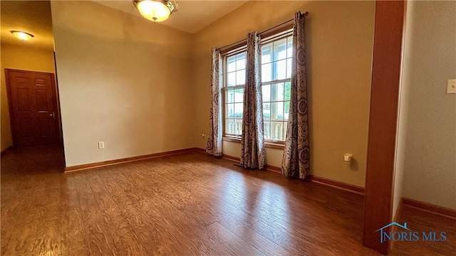 12327 Buckeye Dr, Paulding, OH 45879 - spare room with wood finished floors and baseboards