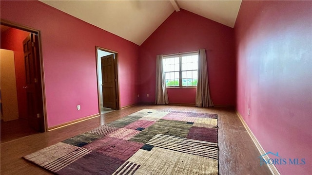 12327 Buckeye Dr, Paulding, OH 45879 - unfurnished bedroom with beam ceiling and high vaulted ceiling