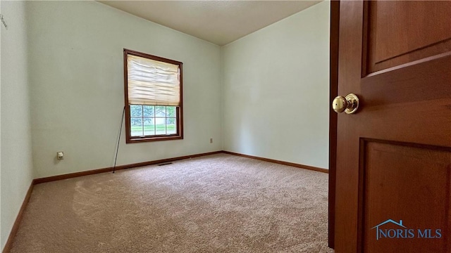 12327 Buckeye Dr, Paulding, OH 45879 - carpeted empty room featuring baseboards